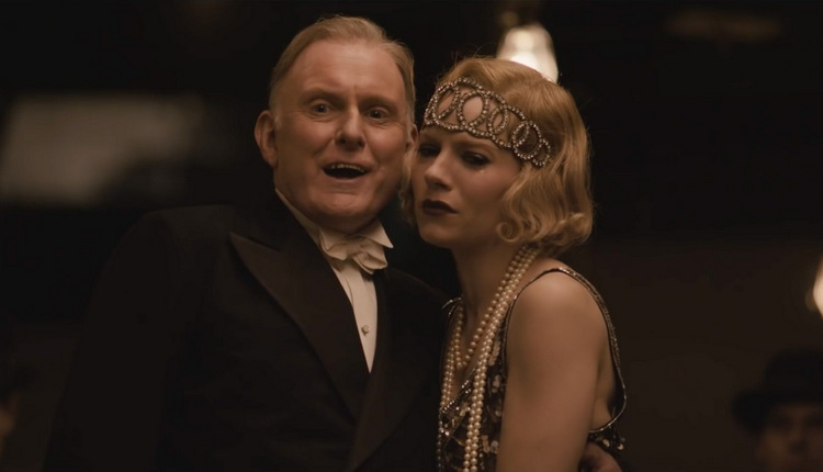Robert Glenister and Sienna Miller in Live by Night