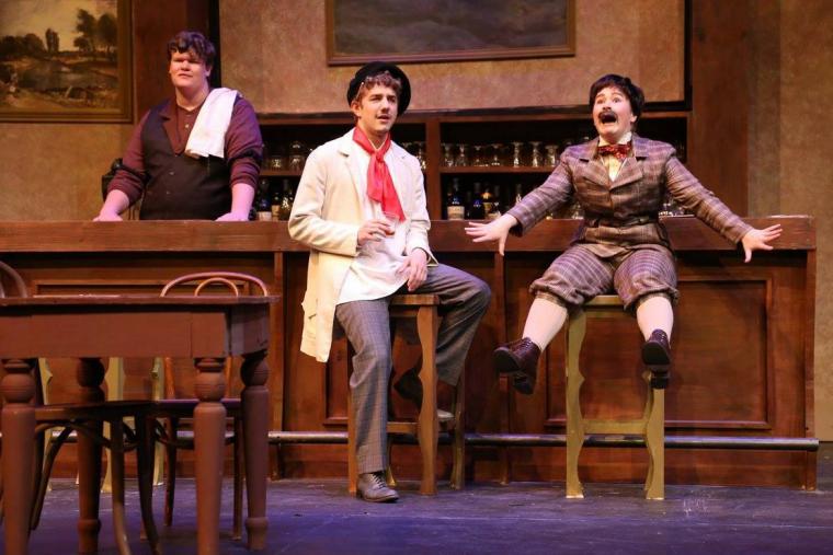 T.J. Green, Jackson Green, and Megan Clarke in St. Ambrose University's Picasso at the Lapin Agile