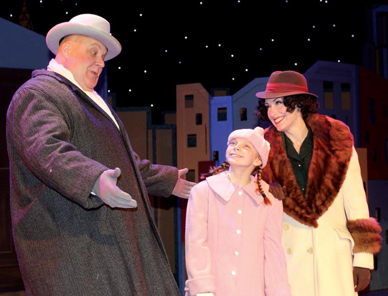 John Payonk, Chloe Knobloch, and Erin Churchill in the Circa '21 Dinner Playhouse's Annie