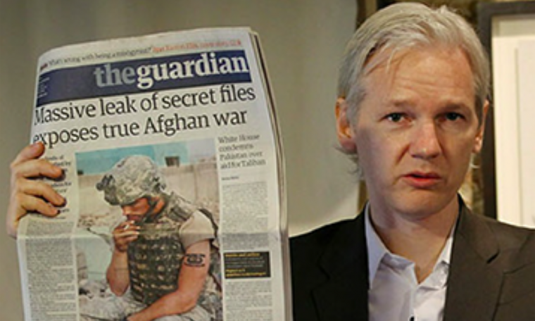 Julian Assange Holding Guardian Newspaper Afghan War Logs